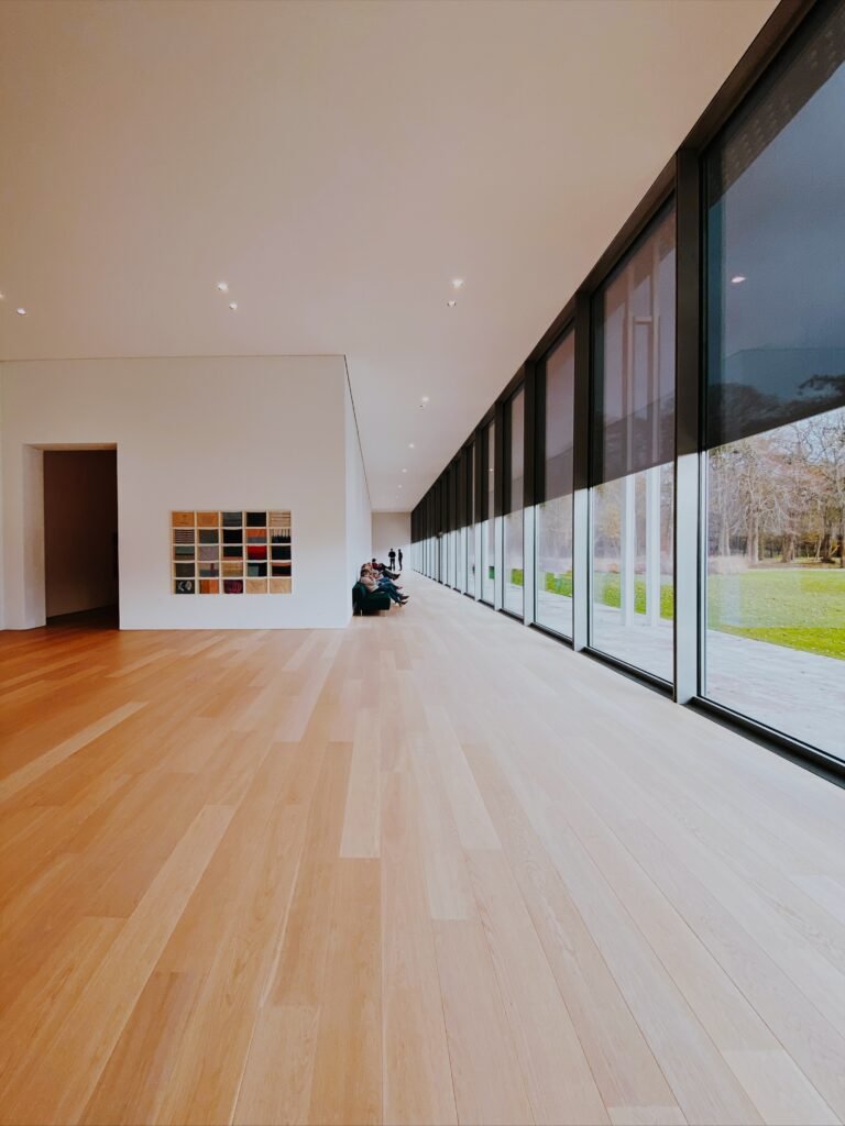 Elegantly designed office corridor with luxury laminate flooring.
